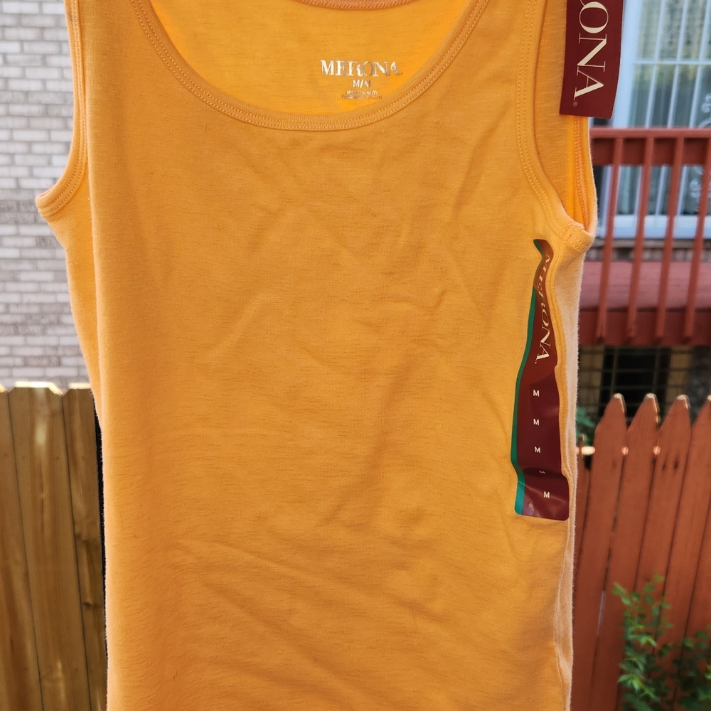 Orange/Peach colored stretchy tank top.